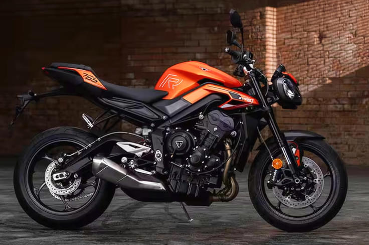 Priced from Rs 10.17 lakh Triumph Street Triple R in orange side profile shot